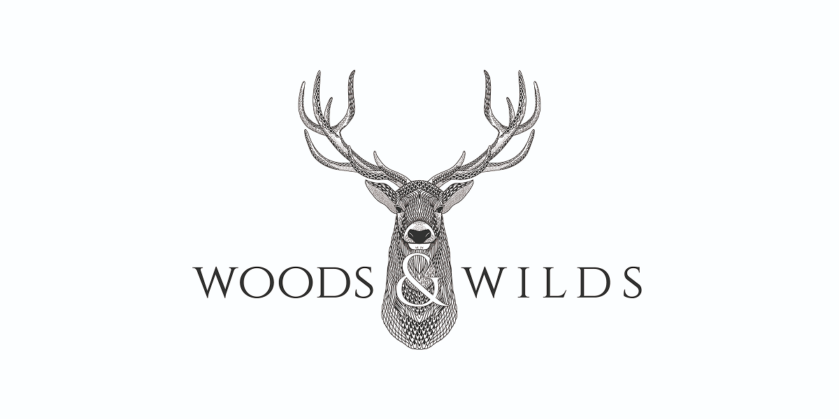 Woods and Wilds Logo Cover